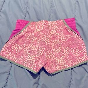 NWOT Nike pink running shorts size small